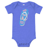prepárate on a chancleta on a blue onesie