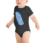 charcoal gray onesie worn by an infant with with you better calmate chancleta graphic on the front